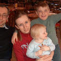 Юра со своими детьми Ниной и Сашей и нашей внучкой Тасей. Кафе "Фрайдис" в ТЦ "Атриум. 8 марта 2005 г.